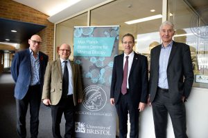 Prof Dek Woolfson, Prof Imre Berger, His Excellency Miguel Berger, and Prof Stephen Mann pose outside the MAx Planck Bristol Centre lab. 